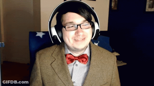 Man In Headphones And Red Bow Tie Smiling GIF