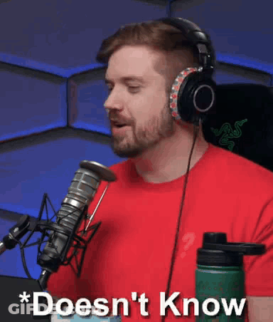Man In Headphones And Red Shirt Saying Doesn't Know GIF