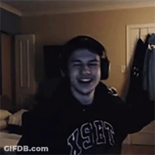 Man In Headphones And RSR Sweatshirt Laughing GIF