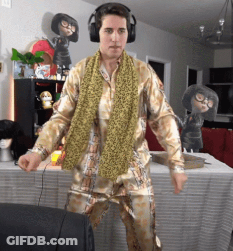 Man In Headphones And Scarf Dancing GIF