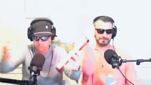 Man In Headphones And Sunglasses Holding Baseball Bat GIF