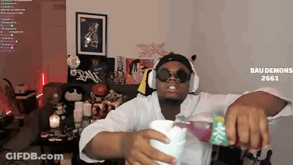 Man In Headphones And Sunglasses Pouring Drink GIF