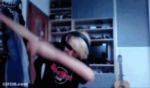 Man In Headphones And Supreme Shirt Dabbing GIF