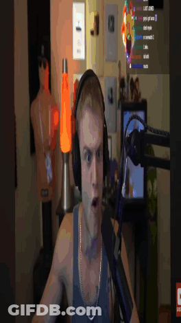 Man In Headphones And Tank Top At Microphone GIF