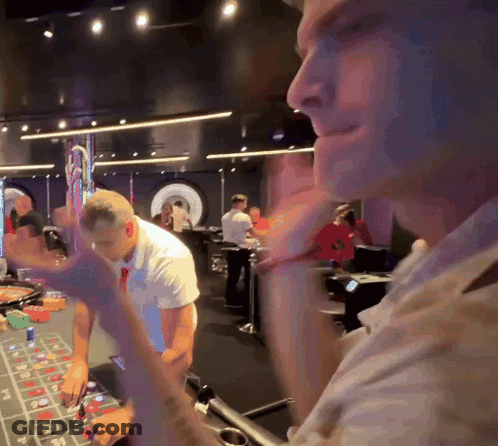 Man In Headphones And Tank Top Listening To Music GIF