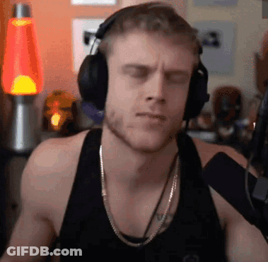 Man In Headphones And Tank Top Listening To Music GIF