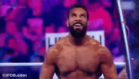 Man In Headphones And Tank Top Says Watch GIF
