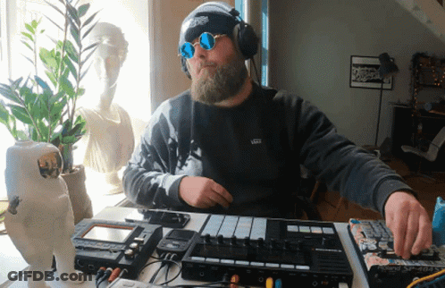 Man In Headphones And Vans Sweatshirt GIF