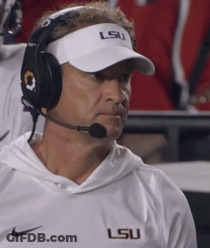 Man In Headphones And Visor Saying LSU GIF