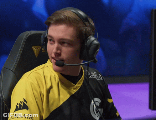 Man In Headphones And Yellow Corsair Shirt GIF