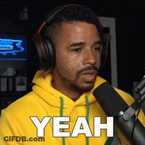 Man In Headphones And Yellow Hoodie Saying Yeah GIF