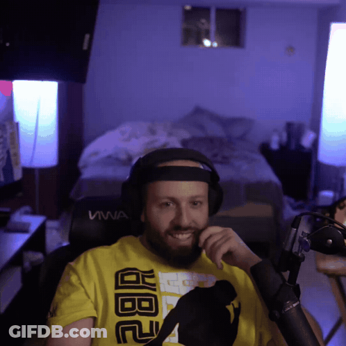 Man In Headphones And Yellow Shirt Saying AB2 GIF