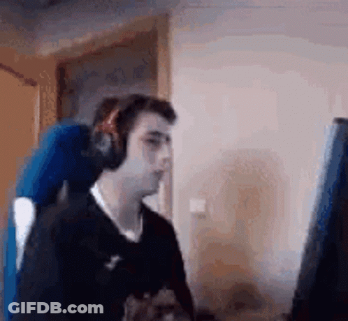 Man In Headphones At Computer GIF