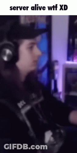 Man In Headphones At Computer With Server Alive WTF XD GIF