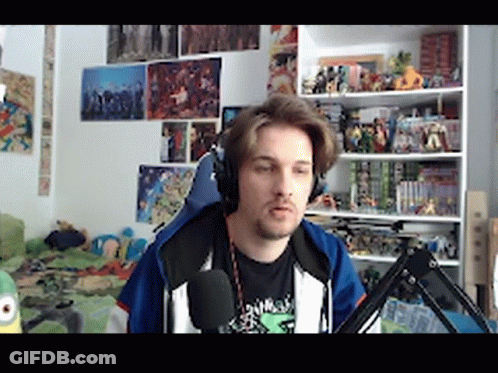 Man In Headphones At Microphone In Bedroom GIF
