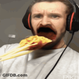 Man In Headphones Eating Spaghetti GIF