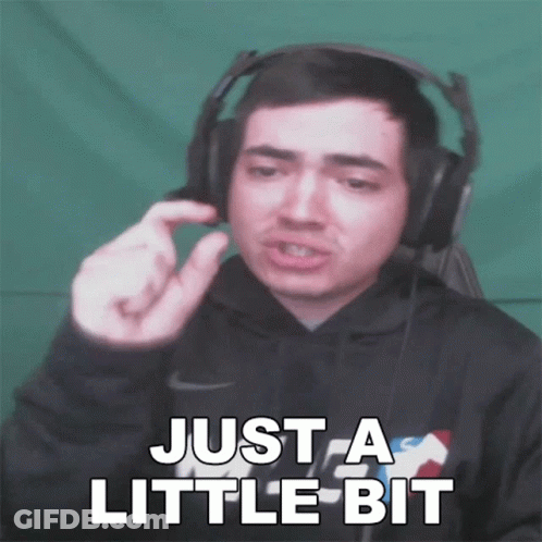 Man In Headphones Funny Face Saying Just A Little Bit GIF