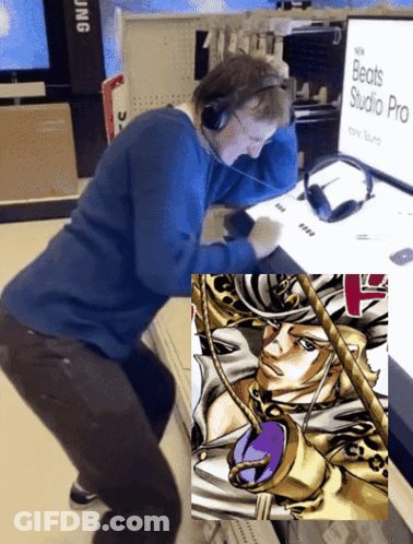 Man In Headphones Looking At Beats Studio Pro Monitor GIF