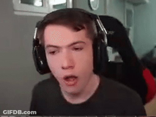 Man In Headphones Making Funny Face GIF