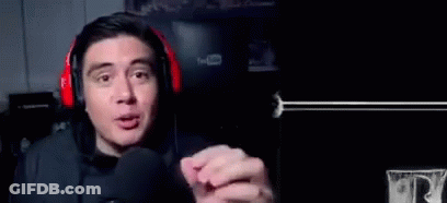 Man In Headphones Making Funny Face Playing Video Game GIF