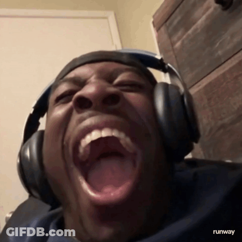 Man In Headphones Making Funny Face With Runway GIF