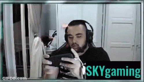 Man In Headphones Playing Skygaming GIF