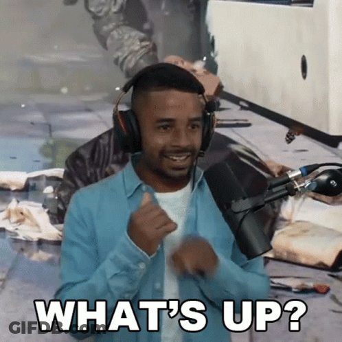 Man In Headphones Saying What's Up At Microphone GIF