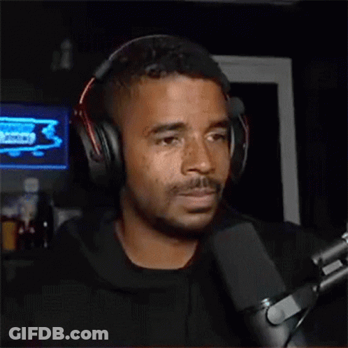 Man In Headphones Singing Into Microphone GIF