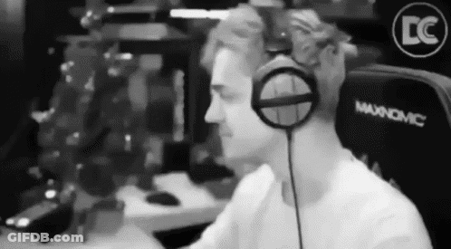 Man In Headphones Sitting At Computer GIF