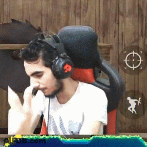 Man In Headphones Sitting In Chair GIF