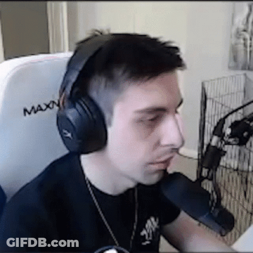 Man In Headphones Sitting With Microphone GIF