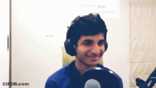 Man In Headphones Smiling At Microphone Lotus App Sign GIF