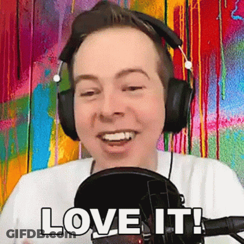Man In Headphones Smiling At Microphone Saying Love It GIF
