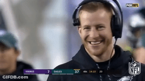 Man In Headphones Smiling At Vikings Vs Eagles Game GIF