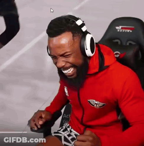 Man In Headphones Smiling In Chair GIF