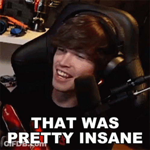 Man In Headphones Smiling In Gaming Chair GIF