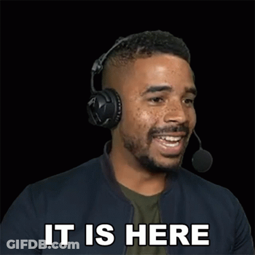 Man In Headphones Smiling Saying It Is Here GIF