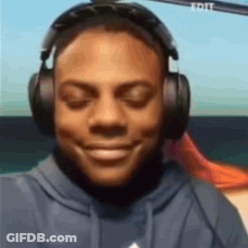 Man In Headphones Smiling With Eyes Closed GIF