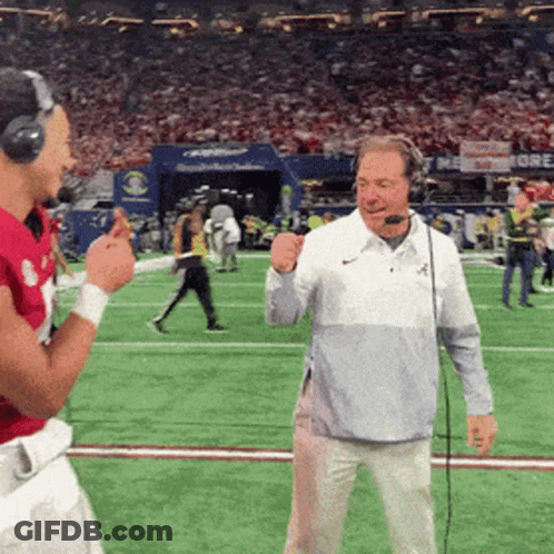 Man In Headphones Talking Into Microphone On Football Field GIF