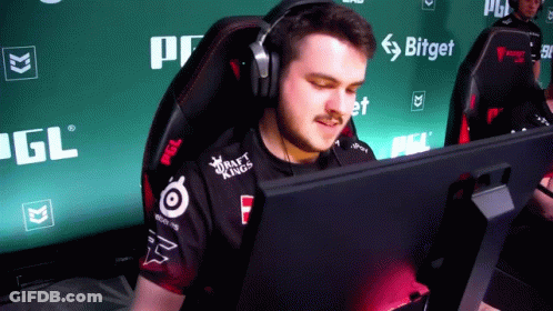 Man In Headphones Wearing Draft Kings Shirt At Computer GIF