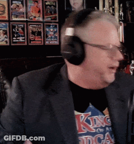 Man In Headphones Wearing King Shirt GIF