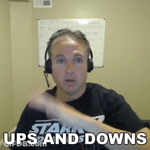 Man In Headphones Wearing Stark Ups And Downs Shirt GIF