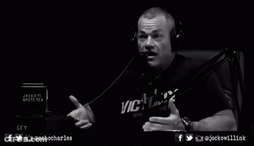 Man In Headphones Wearing Victory Shirt GIF