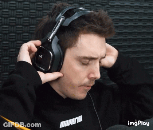 Man In Headphones With Maverick GIF