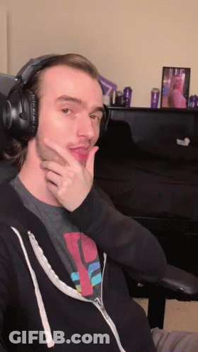 Man In Headphones With P Shirt GIF