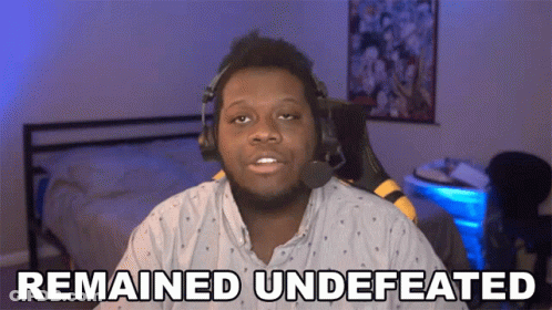 Man In Headphones With Remained Undefeated Shirt GIF