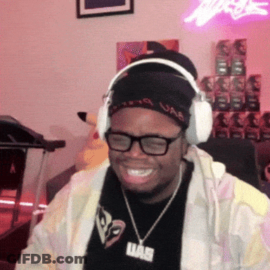 Man In Headphones With UAE Pendant GIF