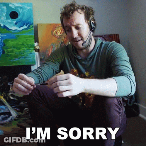 Man In Headset Saying I'm Sorry Holding Pen GIF