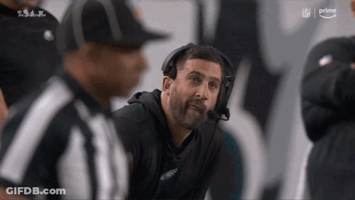 Man In Headset With NFL Logo GIF