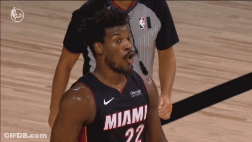 Man In Heat Jersey Sitting In Stadium GIF